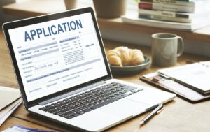 Computer showing application form