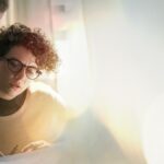 Image of 2 women looking at a sheet of paper