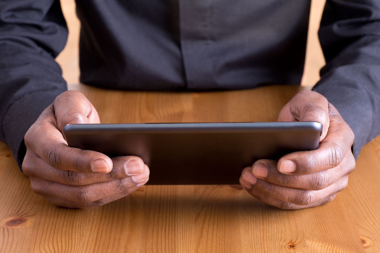 man using tablet